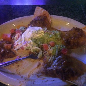 Texican Cafe - Menchaca - Nachos literally came with five chips.  Bartender didn't seem to care much unti I was taking a picture of my plate.  No more Texican Cafe - Mexican Near Me - Austin, Texas