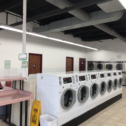 Susys Laundry Mat - Front load washers, these are $3.5 each use. Dryers against the wall in the back.