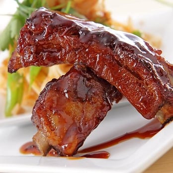 Garden Grille & Bar - Pan Asian Ribs- Slow Cooked fall-off-the-bone ribs with a sweet and tangy honey-citrus pepper glaze. | 22 - Salad Near Me - Oxnard, California Garden Grille & Bar - Pan Asian Ribs- Slow Cooked fall-off-the-bone ribs with a sweet and tangy honey-citrus pepper glaze. | 22 - Salad Near Me - Oxnard, California