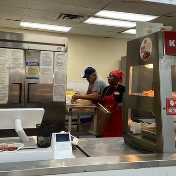 Krispy Krunchy Chicken - two people in a kitchen - Chicken Shop Near Me - Las Vegas, Nevada Krispy Krunchy Chicken - two people in a kitchen - Chicken Shop Near Me - Las Vegas, Nevada