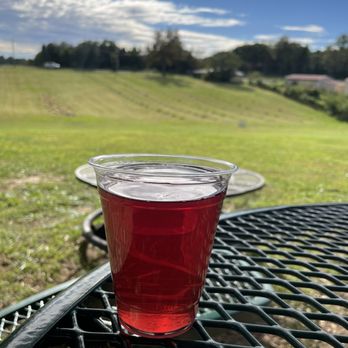 Two Story Chimney Ciderworks - The view with blackberry cider - Cideries Near Me - Gaithersburg, Maryland