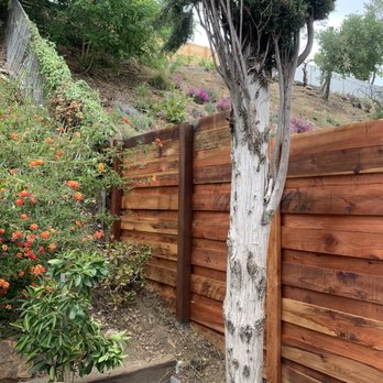 Gomez Hauling - Back side of new fence - Couriers & Delivery Services Near Me