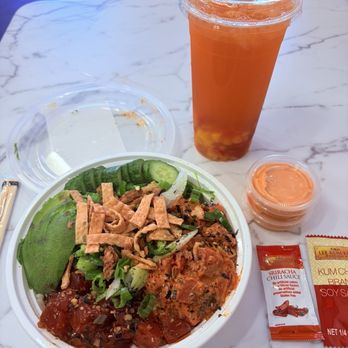 PB Poke House - The Dynamite with white rice, cucumber, kimchi, wontons, crispy onion, avocado, spicy mayo on the side. FRESH Strawberry Mango Lemonade. - Poke Near Me - San Diego, California PB Poke House - The Dynamite with white rice, cucumber, kimchi, wontons, crispy onion, avocado, spicy mayo on the side. FRESH Strawberry Mango Lemonade. - Poke Near Me - San Diego, California