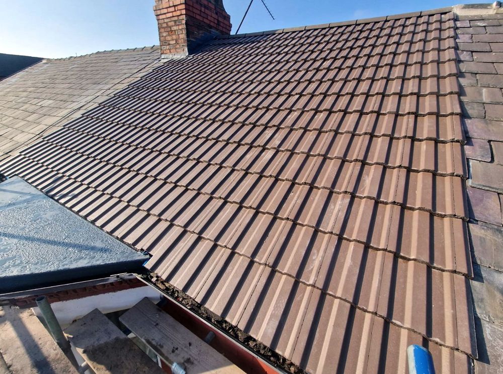 Slide of North Shattuck Roofing