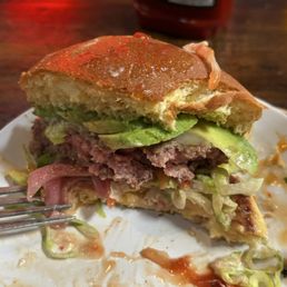 The terrific Finney's burger (cut in half to show the perfectly done burger -- a true med/med-rare)