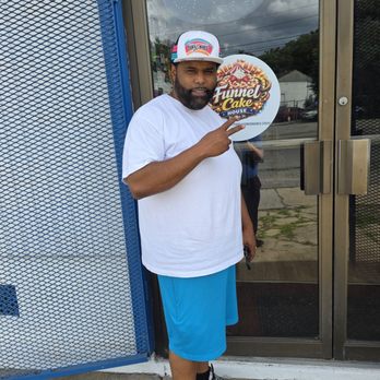 The Funnel Cake House - Darren, the owner and cook of this locally-owned and operated restaurant standing in front of the entrance. - Patisserie/Cake Shop Near Me - Roanoke, Virginia The Funnel Cake House - Darren, the owner and cook of this locally-owned and operated restaurant standing in front of the entrance. - Patisserie/Cake Shop Near Me - Roanoke, Virginia