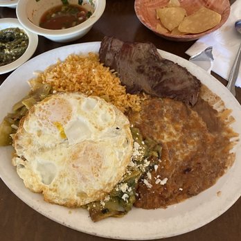 Rudy's - Green Chilaquiles, Eggs, side of steak that I ordered extra, the usual beans and rice - Mexican Near Me - Monrovia, California