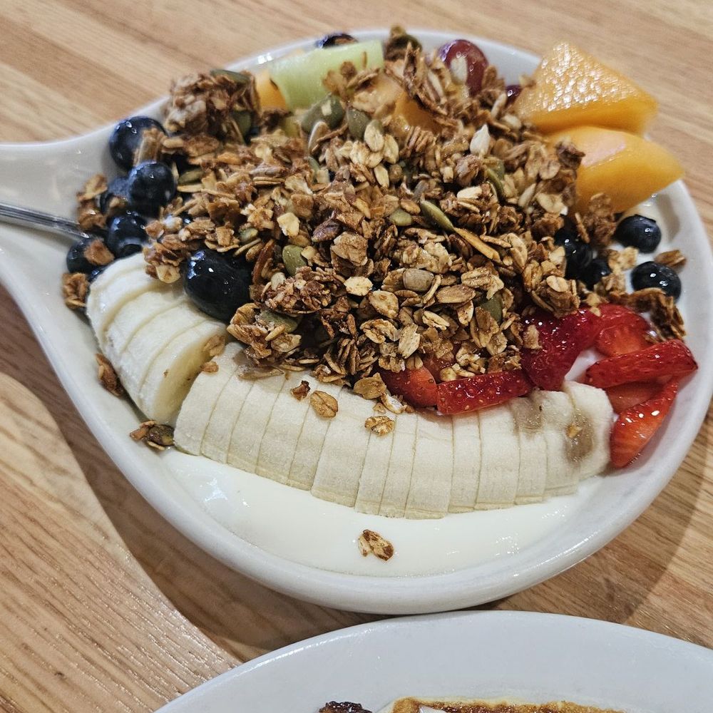 Fruit and yogurt granola bowl