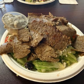 Nikos Greek Kitchen - Nikos Salad with side of tzatziki sauce - Greek Near Me - Sparks, Nevada