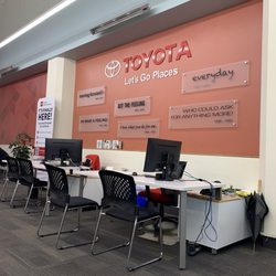 San Francisco Toyota - All the different Toyota mottos over time on the wall