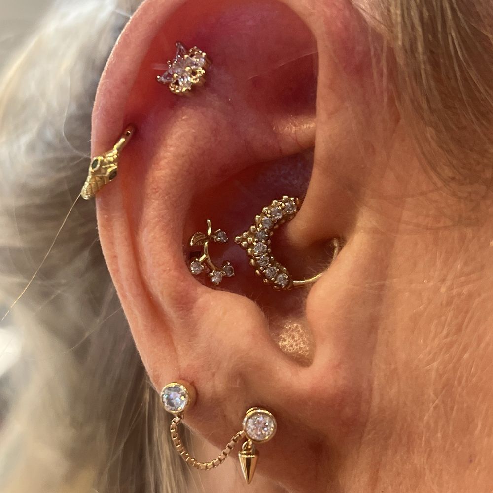 Nomad Body Piercing - Right ear with faith, helix and conch. - Piercing Near Me - San Rafael, California Nomad Body Piercing - Right ear with faith, helix and conch. - Piercing Near Me - San Rafael, California