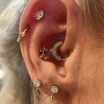 Nomad Body Piercing - Right ear with faith, helix and conch. - Piercing Near Me - San Rafael, California Nomad Body Piercing - Right ear with faith, helix and conch. - Piercing Near Me - San Rafael, California