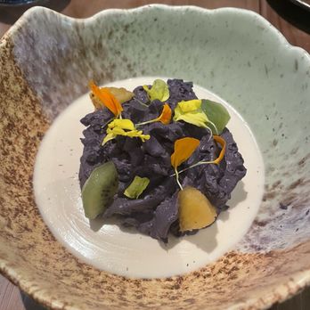 Space Cowboy - The ube panna cotta: this is one of their most popular dishes and I thought it was very unique and fun! Not had anything like it :) - Cocktail Bars Near Me - Austin, Texas