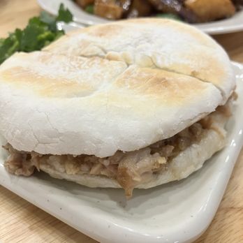 Old Xian's Food - Stewed Pork Burger $6.99 (add cilantro for $0.50) - Chinese Near Me - Coquitlam, British Columbia Old Xian's Food - Stewed Pork Burger $6.99 (add cilantro for $0.50) - Chinese Near Me - Coquitlam, British Columbia