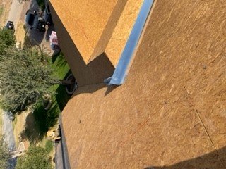 Slide of Black Spade Roofing