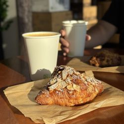 Cartel Roasting Co. - Almond croissant and latte