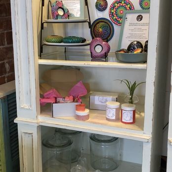 Ohh Macarons - a display of macarons in a cabinet - Desserts Near Me - Bothell, Washington