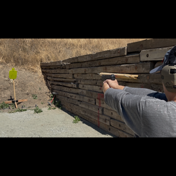 Coco Firearm Training - I am shooting a metal target - Firearm Training Near Me