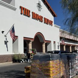 Exterior outside entrance of The Home Depot - Shopping nursery area in afternoon BEwARE the cement floors wet & slippery from watering - Tucson, Arizona Exterior outside entrance of The Home Depot - Shopping nursery area in afternoon BEwARE the cement floors wet & slippery from watering - Tucson, Arizona