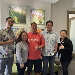 My fiancé and I (2nd and 3rd from left) at our escrow signing with Ryan Oda (fourth from left).