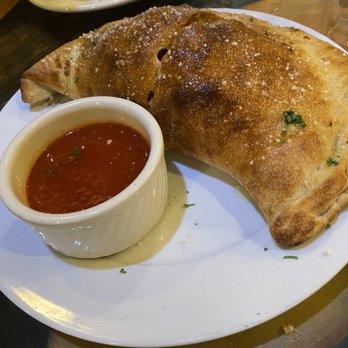 Nonnas Pizza Restaurant - Calzone - Pizza Near Me - Bradenton, Florida