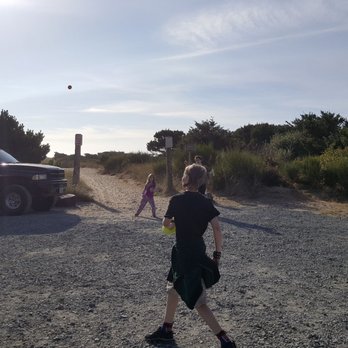 Barview Jetty Campground - Kids playing ball in parking area before beach access from barview Jetty Campground Oregon - Campgrounds Near Me - Rockaway Beach, Oregon Barview Jetty Campground - Kids playing ball in parking area before beach access from barview Jetty Campground Oregon - Campgrounds Near Me - Rockaway Beach, Oregon