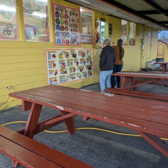 Gordos Mini Tacos & Snacks - Eating area, Cream Corn Stand across the taco truck - Food Trucks Near Me - San Antonio, Texas