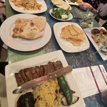 Cafe Caspian - Beef Barg with upgraded javaher polow, fesenjan stew with upgraded zereshk polow, crispy rice tadig and hummus. - Persian/Iranian Near Me - Houston, Texas Cafe Caspian - Beef Barg with upgraded javaher polow, fesenjan stew with upgraded zereshk polow, crispy rice tadig and hummus. - Persian/Iranian Near Me - Houston, Texas