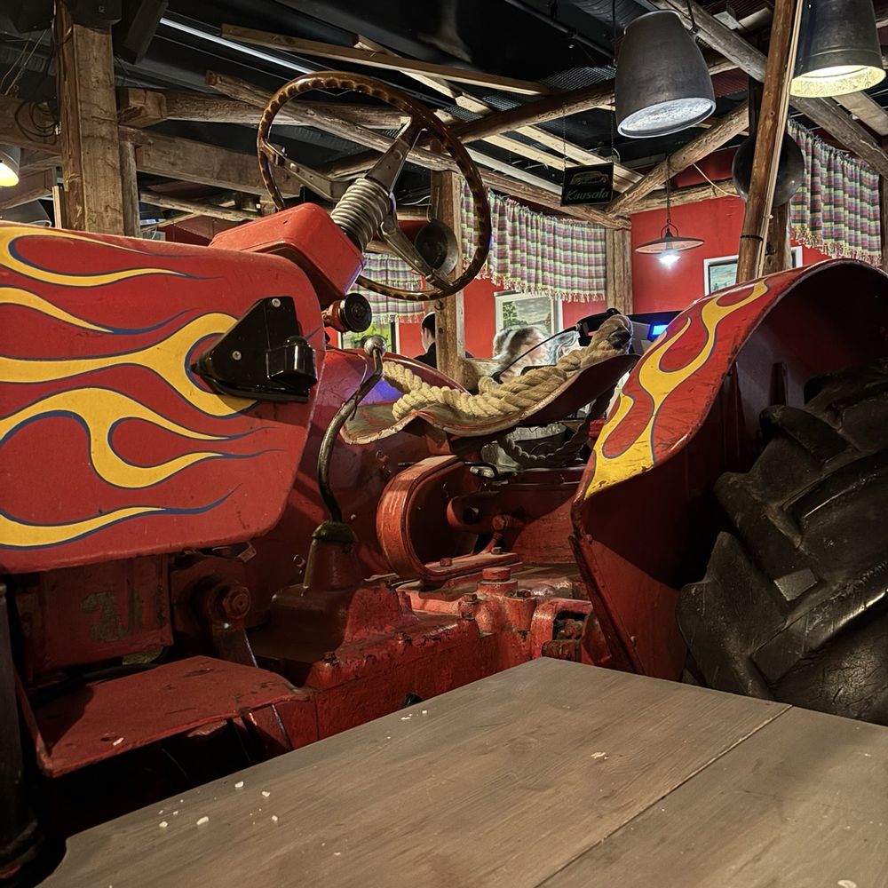Zetor - Tractor in the middle of the restaurant - Comfort Food Near Me - Helsinki, 18 Zetor - Tractor in the middle of the restaurant - Comfort Food Near Me - Helsinki, 18