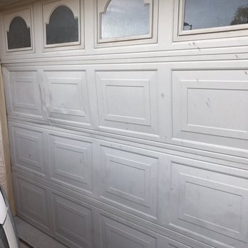 Triple B Garage Doors & Gates - Before pic. Smashed garage door. - Garage Door Services Near Me - Mesa, Arizona Triple B Garage Doors & Gates - Before pic. Smashed garage door. - Garage Door Services Near Me - Mesa, Arizona