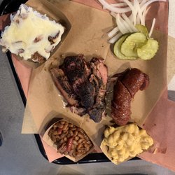 Crydermans Barbecue - $32 with water to drink. 3/4 pound of brisket, 1 sausage link, single Mac n cheese, singles beans, bread pudding.