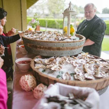 Park Avenue Catering - Our amazing oyster bar! People were raving about how fresh and delicious the oysters were! Decor on the table was supplied by Park Avenue. - Caterers Near Me - Cotati, California Park Avenue Catering - Our amazing oyster bar! People were raving about how fresh and delicious the oysters were! Decor on the table was supplied by Park Avenue. - Caterers Near Me - Cotati, California