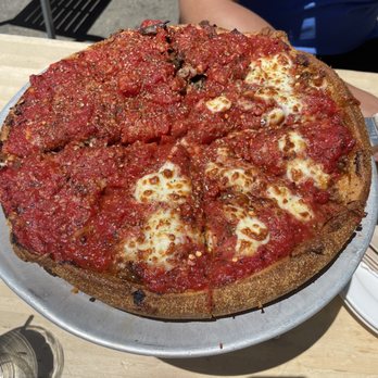 Blue Line Pizza - Large half and half of chicago chop on the right and brass monkey on the left. - Pizza Near Me - Danville, California Blue Line Pizza - Large half and half of chicago chop on the right and brass monkey on the left. - Pizza Near Me - Danville, California