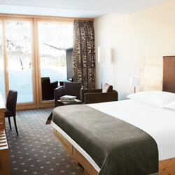 Nira Alpina - Each room opens up into our private garden that offers uninterrupted views of the spectacular snow-capped Engadin mountain peaks.