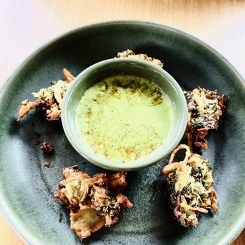 Nirvana Indian Restaurant - Dive Dipping: (Kale Kanda Baji: Kale Fritters W/ Sweet Onions+Herbs+Chickpea Batter+Mint Yogurt Dipping Sauce) - Indian Near Me - Woodstock, New York