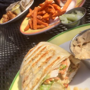 Stone Mill Bakery - (top left to bottom) Veggie Wrap with honey mustard dip, Chicken Satay Wrap with pickled cucumbers and Sweet Potato Fries - Bakeries Near Me - Lutherville Timonium, Maryland Stone Mill Bakery - (top left to bottom) Veggie Wrap with honey mustard dip, Chicken Satay Wrap with pickled cucumbers and Sweet Potato Fries - Bakeries Near Me - Lutherville Timonium, Maryland