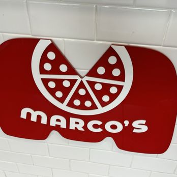 Marco's Pizza - Logo on counter - Pizza Near Me - Port Saint Lucie, Florida Marco's Pizza - Logo on counter - Pizza Near Me - Port Saint Lucie, Florida