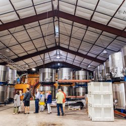 Emeritus Vineyards - Owner Brice, leading a group through our winery