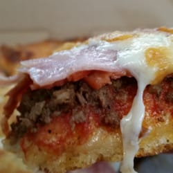 Sammy's World's Greatest Pizza - Braeside Location - First bite is delicious.