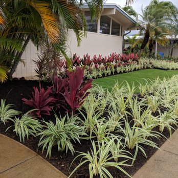 A & K Landscape Services - Side path and lawn - Tree Services Near Me