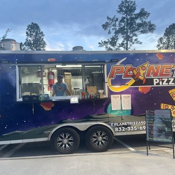 Planet Pizza - a food truck parked in a parking lot - Pizza Near Me Planet Pizza - a food truck parked in a parking lot - Pizza Near Me