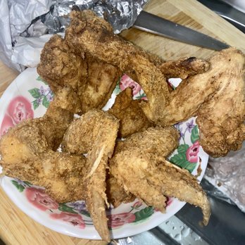 Dallas BBQ - Jamaica - Chicken wings with feathers attached. Not cleaned properly. How can people eat this like this? - Barbeque Near Me - Jamaica, New York Dallas BBQ - Jamaica - Chicken wings with feathers attached. Not cleaned properly. How can people eat this like this? - Barbeque Near Me - Jamaica, New York