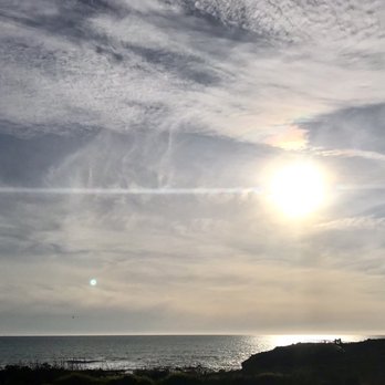 Fireside Inn on Moonstone Beach - View from the parking lot. - Hotels Near Me - Cambria, California