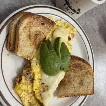 Parkside Diner - Bacon, Swiss, and avocado omelette with sour dough toast - Diners Near Me - Rochester, New York Parkside Diner - Bacon, Swiss, and avocado omelette with sour dough toast - Diners Near Me - Rochester, New York