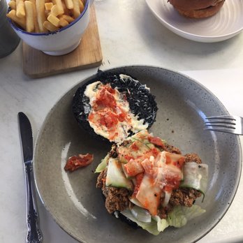 The Loose Caboose Cafe - chicken burger with Japanese mayo, charcoal bun, iceberg lettuce and kimchi - Cafes Near Me - Hindmarsh, SA