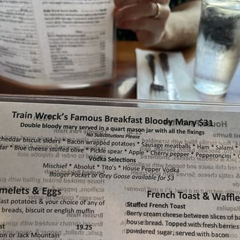 Train Wreck Bar - Double Breakfast Bloody Mary description from the menu. - Sports Bars Near Me - Burlington, Washington Train Wreck Bar - Double Breakfast Bloody Mary description from the menu. - Sports Bars Near Me - Burlington, Washington