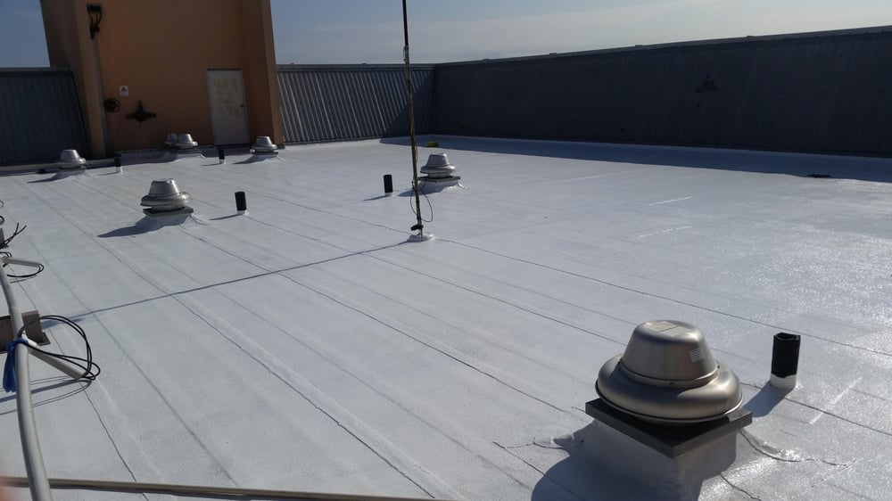 Slide of IES Roofing Services