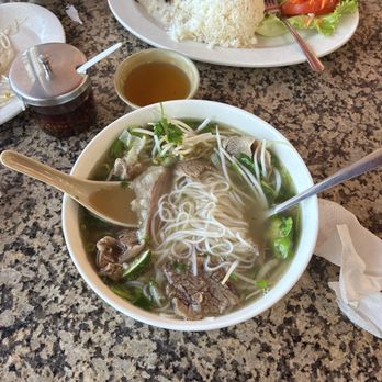 Pho Saigon - #11 Phở Tái (Beef Noodle Soup w/ Eye Round Steak) *LARGE SIZE ONLY* beef #54 Cơm Gà Nướng (Steamed Rice w/ Chargrilled Chicken) - Vietnamese Near Me - Sugar Land, Texas Pho Saigon - #11 Phở Tái (Beef Noodle Soup w/ Eye Round Steak) *LARGE SIZE ONLY* beef #54 Cơm Gà Nướng (Steamed Rice w/ Chargrilled Chicken) - Vietnamese Near Me - Sugar Land, Texas