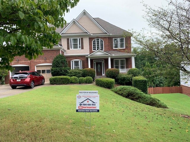 Slide of Veteran's Roofing Company