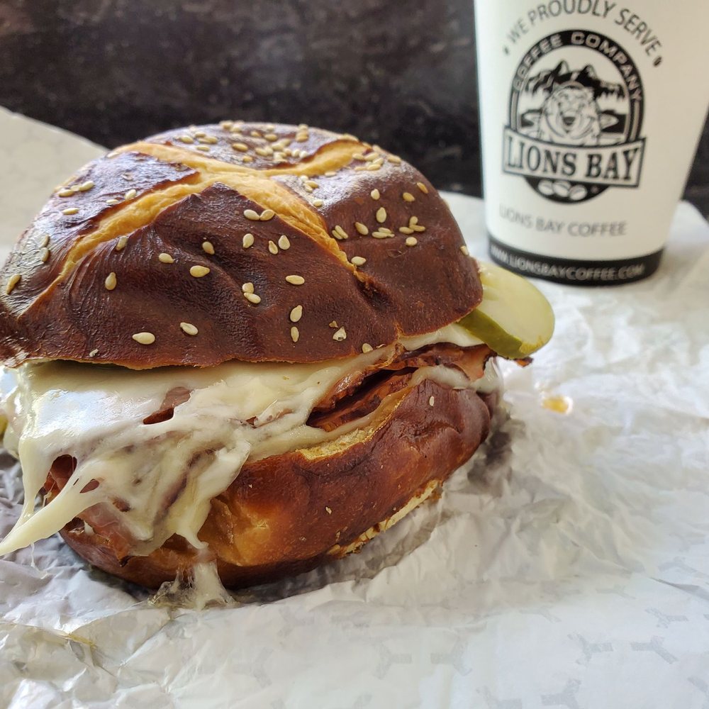 Fresh St. Market - Amaricano and Montreal smoked meat pretzel sandwich. - Grocery Near Me - Vancouver, British Columbia Fresh St. Market - Amaricano and Montreal smoked meat pretzel sandwich. - Grocery Near Me - Vancouver, British Columbia